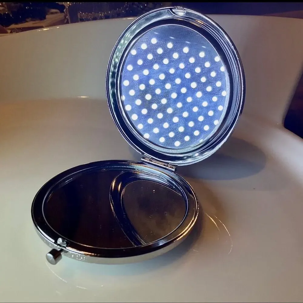 Magnifying compact mirror brand new